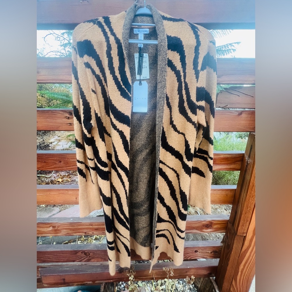 Shin length soft very light sweater jacket